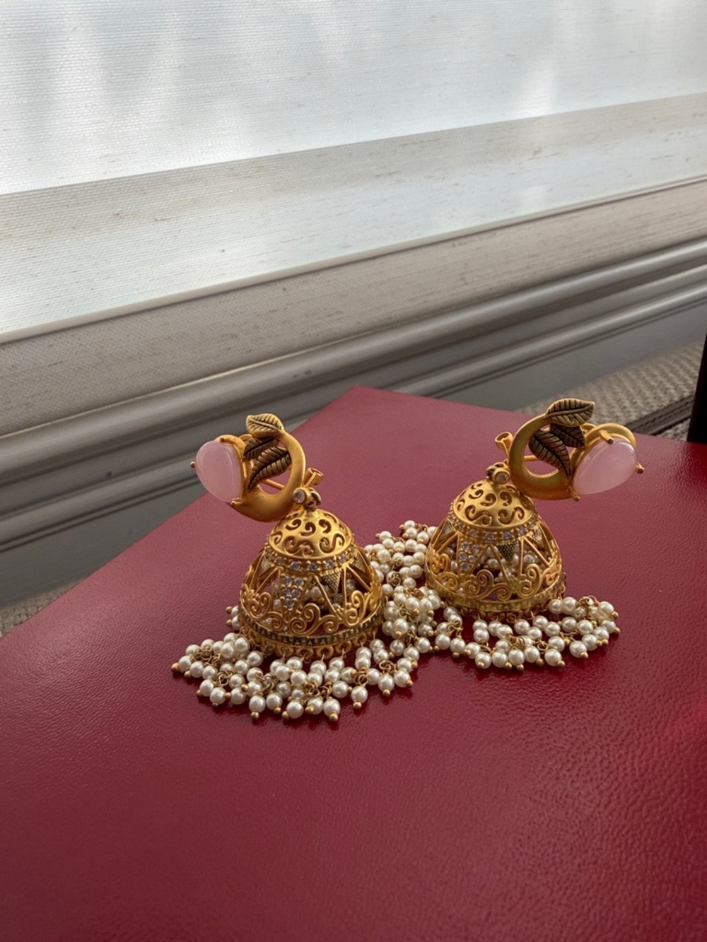 Gold Filigree Jhumka Earrings with Pink Stone and Pearl Fringe